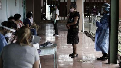Women wait for a coronavirus test in Pavas, Costa Rica. EPA