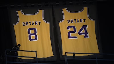 Lights illuminate the jerseys in tribute of former Los Angeles Laker shooting guard, NBA star, Kobe Bryant during the 62nd Annual Grammy Awards on January 26. AFP