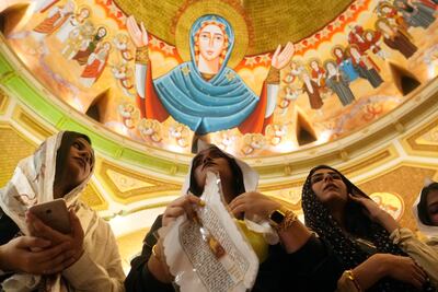 Egyptians attend a Mass at St Paul's Church in Cairo, Egypt in 2022. AP