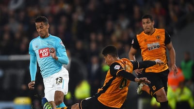 Tom Ince of Derby County battles with Curtis Davies of Hull City during the Sky Bet Championship Play Off semi final second leg match between Hull City and Derby County at KC Stadium on May 17, 2016 in Derby, England. (Photo by Laurence Griffiths/Getty Images)
