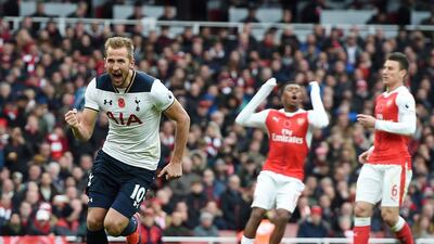 Tottenham's Harry Kane, left, celebrates after scoring from the penalty spot during the English Premier League match against Arsenal at the Emirates Stadium in London, England, November 6, 2016. Andy Rain / EPA