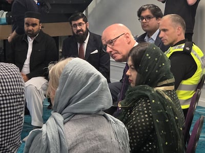 Scotland's First Minister John Swinney and police Supt Neil Wilson during a visit to Broomhouse Mosque in Edinburgh. PA Wire