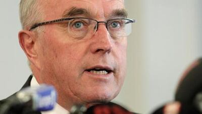 International Cycling Union president Pat McQuade announcing Lance Armstrong's ban from the sport