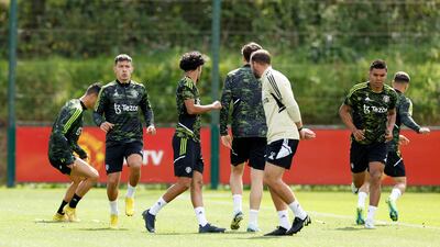 Manchester United's new signings Lisandro Martinez and Casemiro train at Carrington. Reuters
