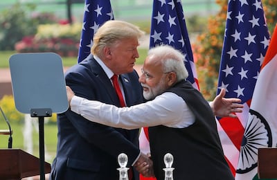 President Donald Trump and Indian Prime Minister Narendra Modi embrace after giving a joint statement in New Delhi, India. AP