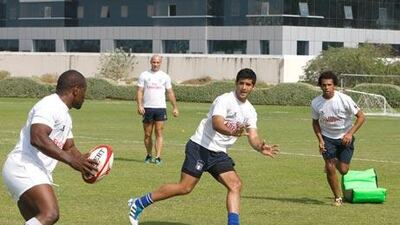 From left, Dave Matasio, Stephane Imbert, Cyrus Homayoun and Mohammed Hassan Rahma prepare for the sevens tournament.