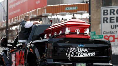 The casket of US rapper DMX is seen on a monster truck on Flatbush avenue outside the Barclays Centre. EPA