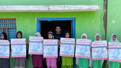 Young women of Nuh, known for poor health infrastructure, dismal literacy rates and consevative society are opening up about menstrual health with their families. They are posing with Sunil Jaglan, the brainchild behind the unique campaign. Taniya Dutta for The National
