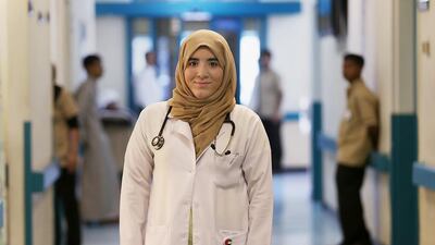 Hessa Ali, an Emirati sixth-year student who works as an intern physician at Khalifa Hospital in Ajman. Her shows a shift in attitudes towards smoking among young people. Pawan Singh / The National
