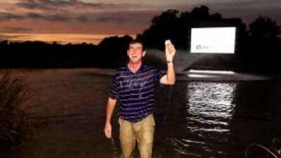Gonzalo Fernandez-Castano of Spain celebrates in the lake after beating Lee Westwood in a play-off at the Belfry.