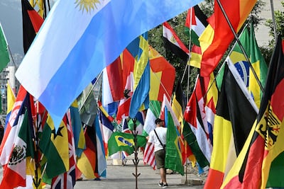 A street vendor in Beirut sells flags of countries participating in World Cup 2026. AFP