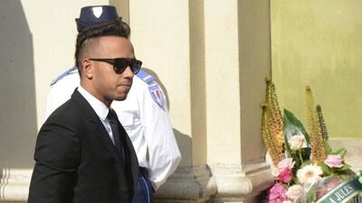 Formula One world champion and championship leader Lewis Hamilton has said F1 has a "tough road ahead." Jean-Pierre Amet / Reuters