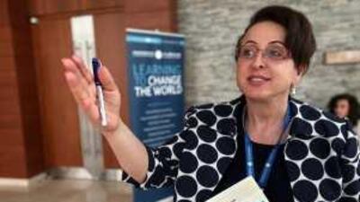 Jumana Judeh, a founder of the Arab American Women's Business Council, speaks at the conference yesterday.