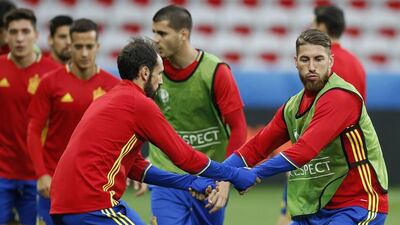 Spanish players Sergio Ramos, right, and Juanfran during a training session of the Spanish team at Stade de Nice in Nice, France, 16 June 2016. Spain will face Turkey in the Euro 2016 Group D match on 17 June 2016. EPA/SEBASTIEN NOGIER