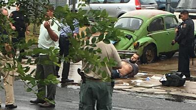 Ahmad Khan Rahami is taken into custody after a shootout with police in Linden, New Jersey on September 19, 2016. Moshe Weiss via AP
