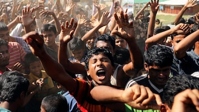 Hundreds of Rohingya refugees shout slogans as they protest against their repatriation at the Unchiprang camp in Teknaf, Bangladesh. Reuters