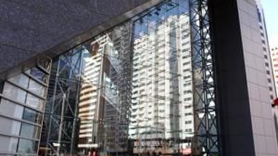 NBAD's profits fell in the fourth quarter after the lender made voluntary collective provisions.