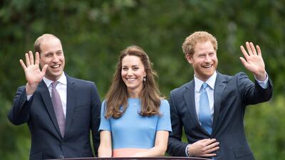 Prince William, Catherine, Duchess of Cambridge and Prince Harry during "The Patron's Lunch" celebrations for The Queen's 90th birthday at The Mall in June 2016. Getty Images