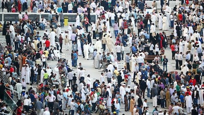 Crowds attend the Dubai World Cup. The National