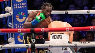Boxer Terence Crawford, left, fights against Israil Madrimov during a super welterweight championship boxing match in Los Angeles, Saturday, Aug. 3, 2024. Crawford, the consensus best pound-for-pound boxer in the world, defeated Madrimov by unanimous decision to become a four-division champion. (AP Photo / Damian Dovarganes)