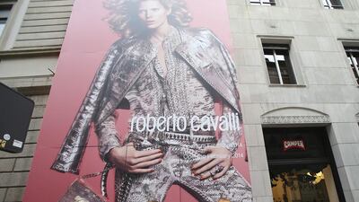 Luxury brands line on the side of Via Montenapoleone, which is Milan’s most famous shopping street. Antonio Calanni / AP Photo
