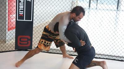 Brazilian UFC fighter Rani Yahya, left, was impressed by what he saw during a jiu-jitsu workshop in Dubai. Courtesy Fit Republik