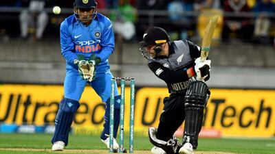 New Zealand's Tim Seifert, right, batting in front of India's MS Dhoni during the Twenty20 international in Wellington, New Zealand, in February 2019. AP Photo