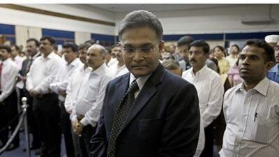 Sanjay Verma, the consul general of India, pauses with other mourners during a prayer vigil honouring the passengers killed in the aircrash in Mangalore, at the Indian Consulate in Bur Dubai yesterday.