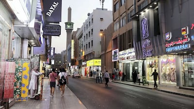 Garment and textile shops in Meena Bazaar, one of Dubai's favourite souqs. Pawan Singh / The National
