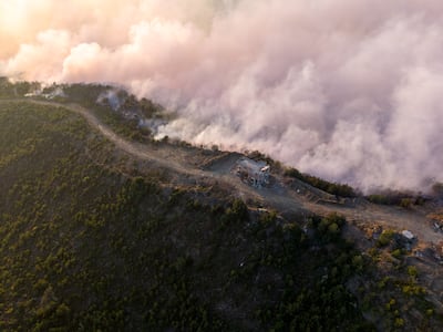 A drone image shows massive fires near Qastal Maaf in Syria. Ahmad Fallaha for The National