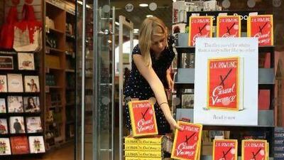 An employee at Foyles bookshop in central London arranges copies of The Casual Vacancy, JK Rowling's much anticipated new novel for grown-ups.