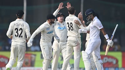 New Zealand celebrate after India's Shreyas Iyer was caught by Tom Blundell off the bowling of Tim Southee. AFP