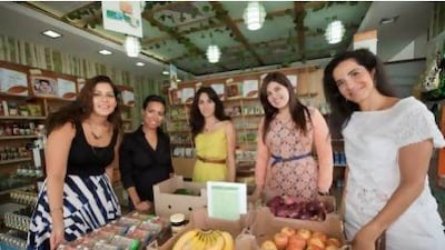 From L to R; Ola Fadda, Kelly Montoya, Aimee-Rose Kennaugh, Heena Aswani, Adriana Mebarr, pose for a portrait at Down to Earth Organic shop. They are taking part in a five day organic food experiment to see if going organic makes them feel any better, if they notice any difference in the quality of the foods. Jaime Puebla / The National