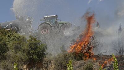 A fire in San Martin de Unx in Navarre region, northern Spain. Some locals have been evacuated as a precaution, while others have left of their own accord. EPA