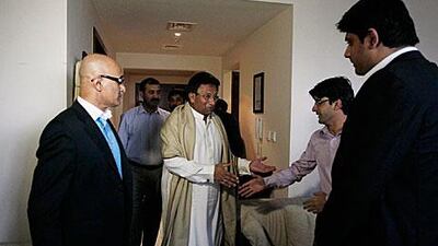 Former Pakistani president Pervez Musharraf arrives ahead of his speech, broadcasted in Dubai, announcing that he will return to the country and prepare for elections.