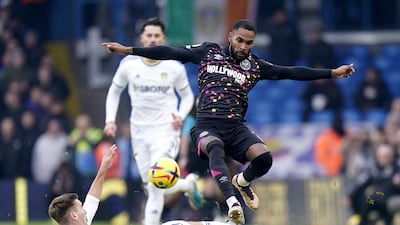 Leeds United's Maximilian Woeber challenges Brentford's Rico Henry. PA