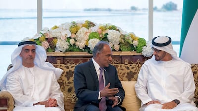 Sheikh Mohammed bin Zayed, Crown Prince of Abu Dhabi and Deputy Supreme Commander of the Armed Forces, receives Shanmugam, Minister for Home Affairs and for Law of Singapore, during a Sea Palace barza. Seen with Sheikh Saif bin Zayed, Deputy Prime Minister and Minister of Interior (L). Hamad Al Kaabi / Crown Prince Court - Abu Dhabi