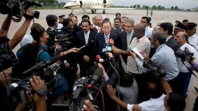 Ban Ki-moon, centre, talks to the media upon his arrival at Chaklala airbase in Rawalpindi, Pakistan.