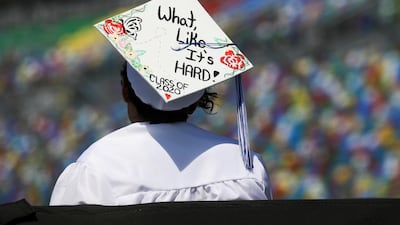 A student of Matanzas High School, which was closed due to coronavirus restrictions, waits to begin the graduation ceremony at Daytona International Speedway in Daytona Beach, Florida, US, May 31. Eve Edelheit / Reuters