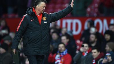 Manager Louis van Gaal of Manchester United waves to fans following his side's 3-1 Premier League win over Leicester City on Saturday. Michael Regan / Getty Images / January 31, 2015