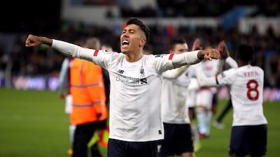 Forward: Roberto Firmino makes Liverpool tick and can play anywhere across the frontline. PA Wire