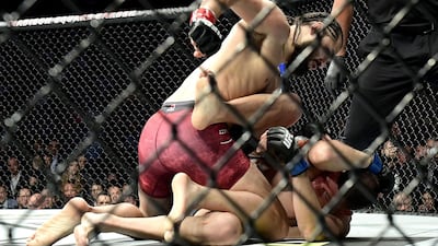 Jorge Masvidal lands blows on Nate Diaz during UFC 244 at Madison Square Garden. AFP
