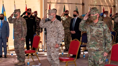 This US Department of Defence photo shows combined Joint Task Force-Operation Inherent Resolve, the military organisation to defeat Daesh in Iraq and Syria, swapping leaders during a change of command ceremony in Baghdad, on September 9, 2020. AFP Photo /DOD/ISAIH VEGA/Handout