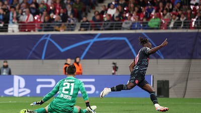 Jeremy Doku of Manchester City celebrates after scoring the third goal against RB Leipzig. Getty