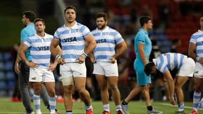 Dejected Argentina players after the match. PA
