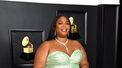 Lizzo, who changed her outfit a few times over the course of the evening, arrived in a mint Balmain dress. EPA