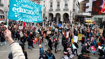 Teachers attend a march during strike action in a dispute over pay in London. Reuters