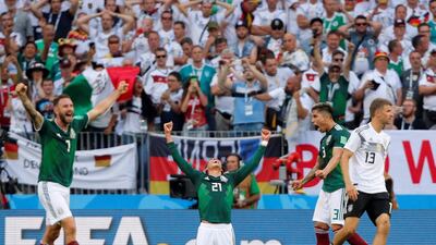 Mexico's Edson Alvarez, Miguel Layun and Carlos Salcedo celebrate at full time as Germany's Thomas Muller looks dejected. Maxim Shemetov / Reuters