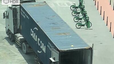 The first batch of containers being loaded at the Dubai Expo 2020 Dubai site with the glazed façade and panels. Photo: France Expo 2020 Dubai