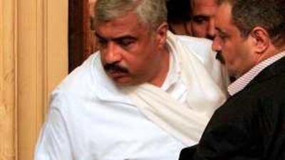 Hisham Talaat Moustafa arrives at court in Cairo in November. He was found guilty of ordering the murder of Suzanne Tamim.